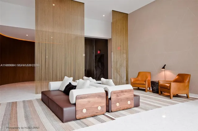 a kitchen with stainless steel appliances a stove a refrigerator and a oven