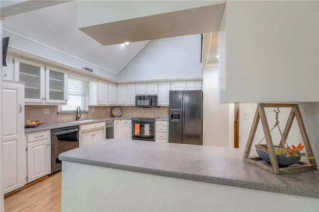 $380,000 | 220 Northwest Aspen Street, Lee's Summit, MO 64064