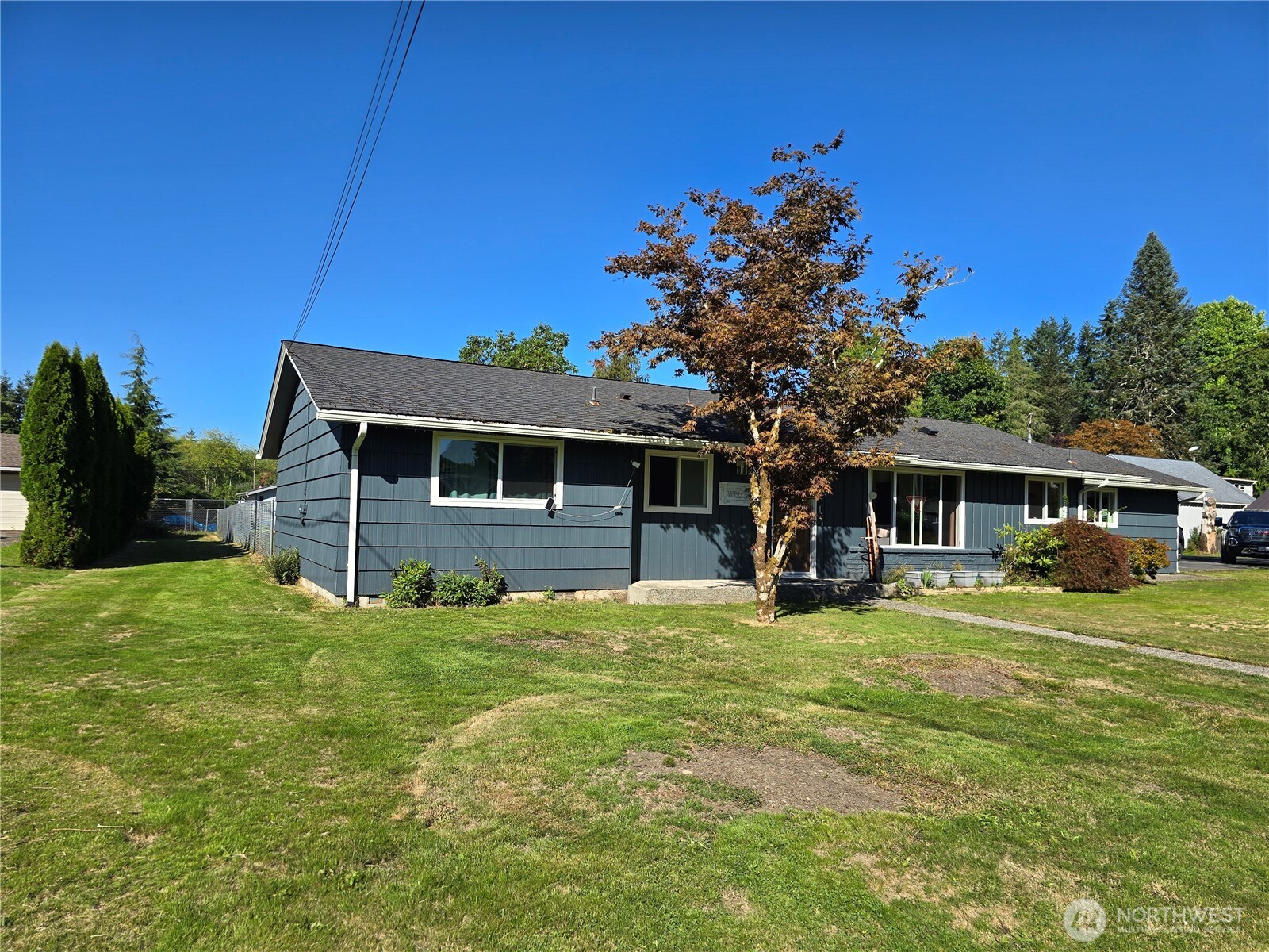 711 F Street Forks, WA 98331 - Photo 25 of 26 a view of a house with a yard