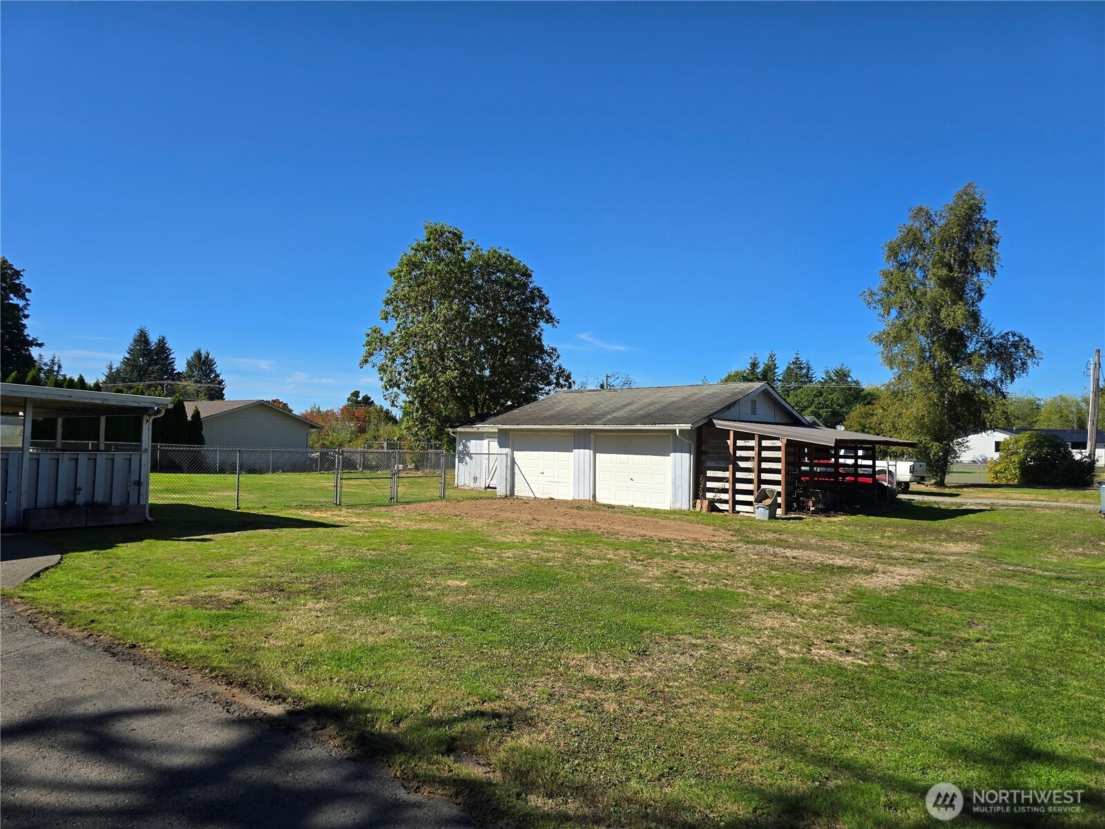 711 F Street Forks, WA 98331 - Photo 26 of 26 a view of a big yard with an outdoor space