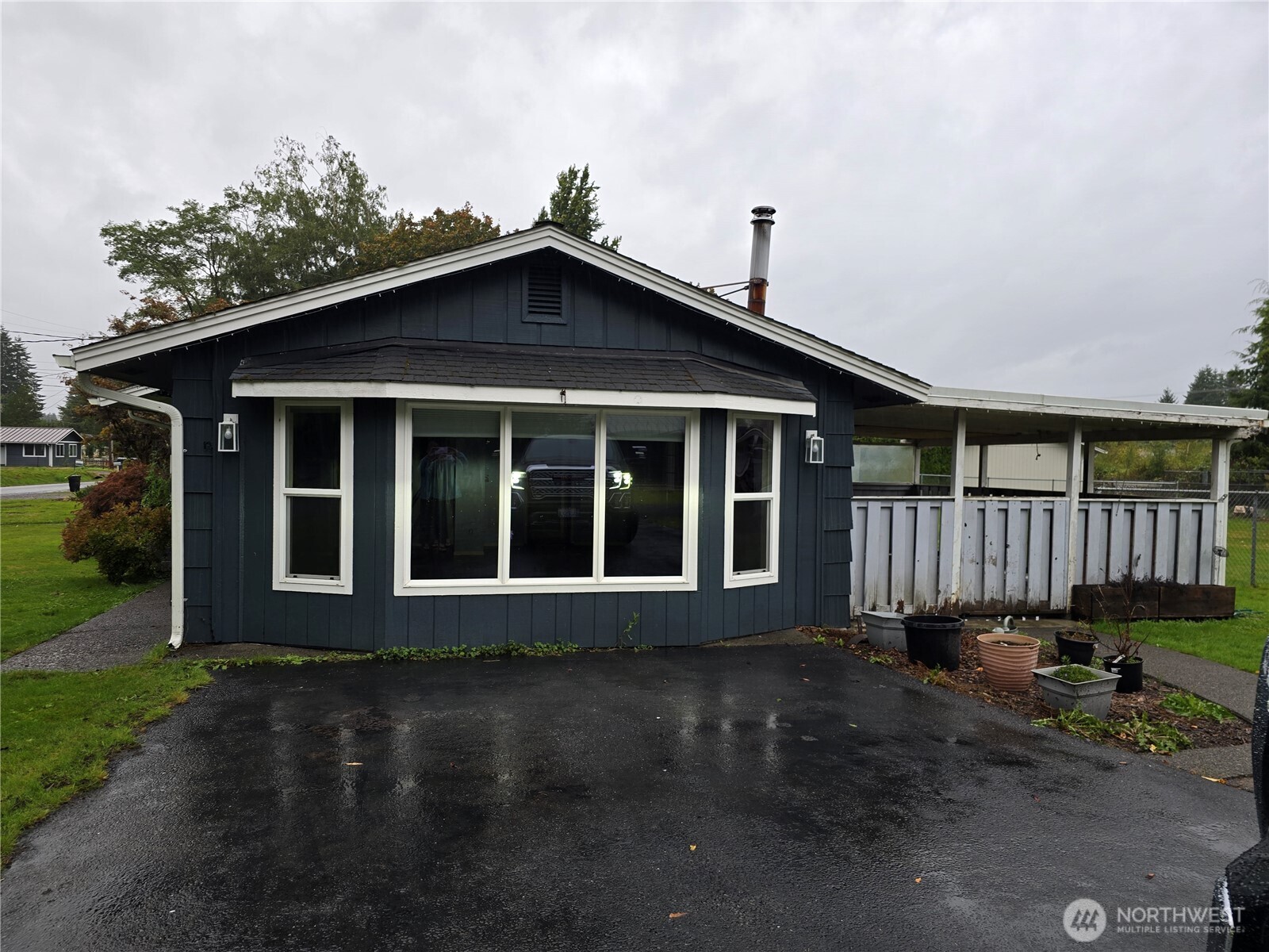 711 F Street Forks, WA 98331 - Photo 3 of 26 a front view of a house with garden