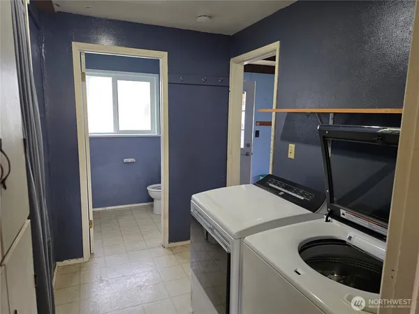 a room with a washer and dryer