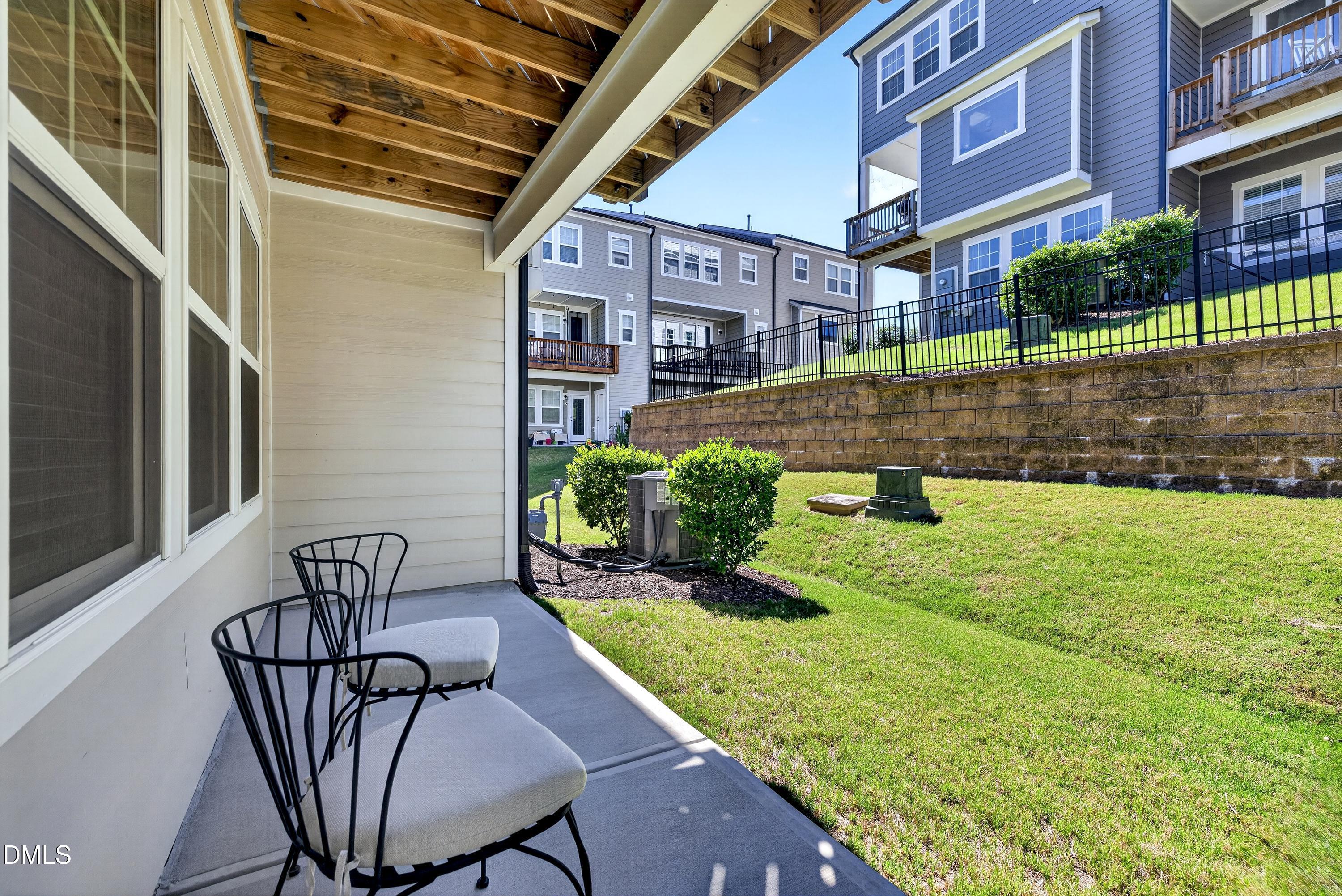 1063 Danvers Loop Apex, NC 27523 - Photo 62 of 67 a view of a chair and table in the patio