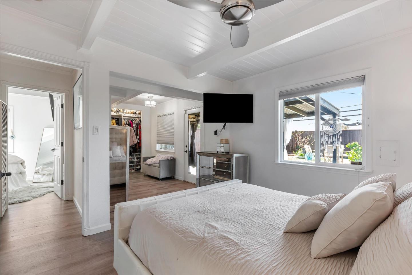 39 Carnegie Drive Milpitas, CA 95035 - Photo 21 of 39 a bedroom with a bed window and a flat screen tv