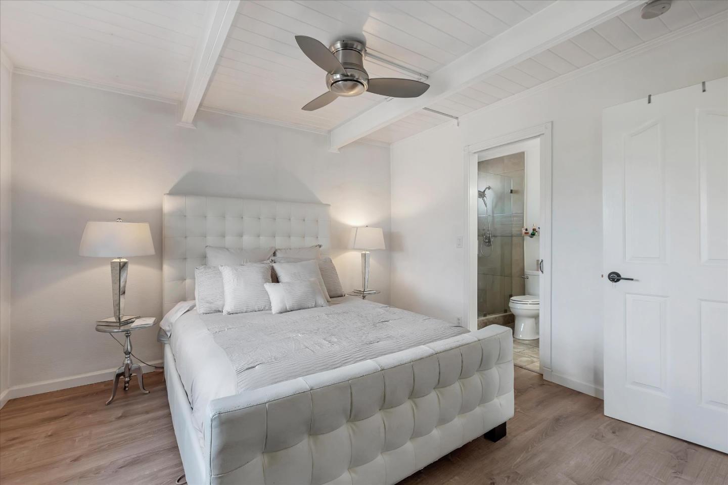 39 Carnegie Drive Milpitas, CA 95035 - Photo 22 of 39 a bedroom with a bed and a ceiling fan