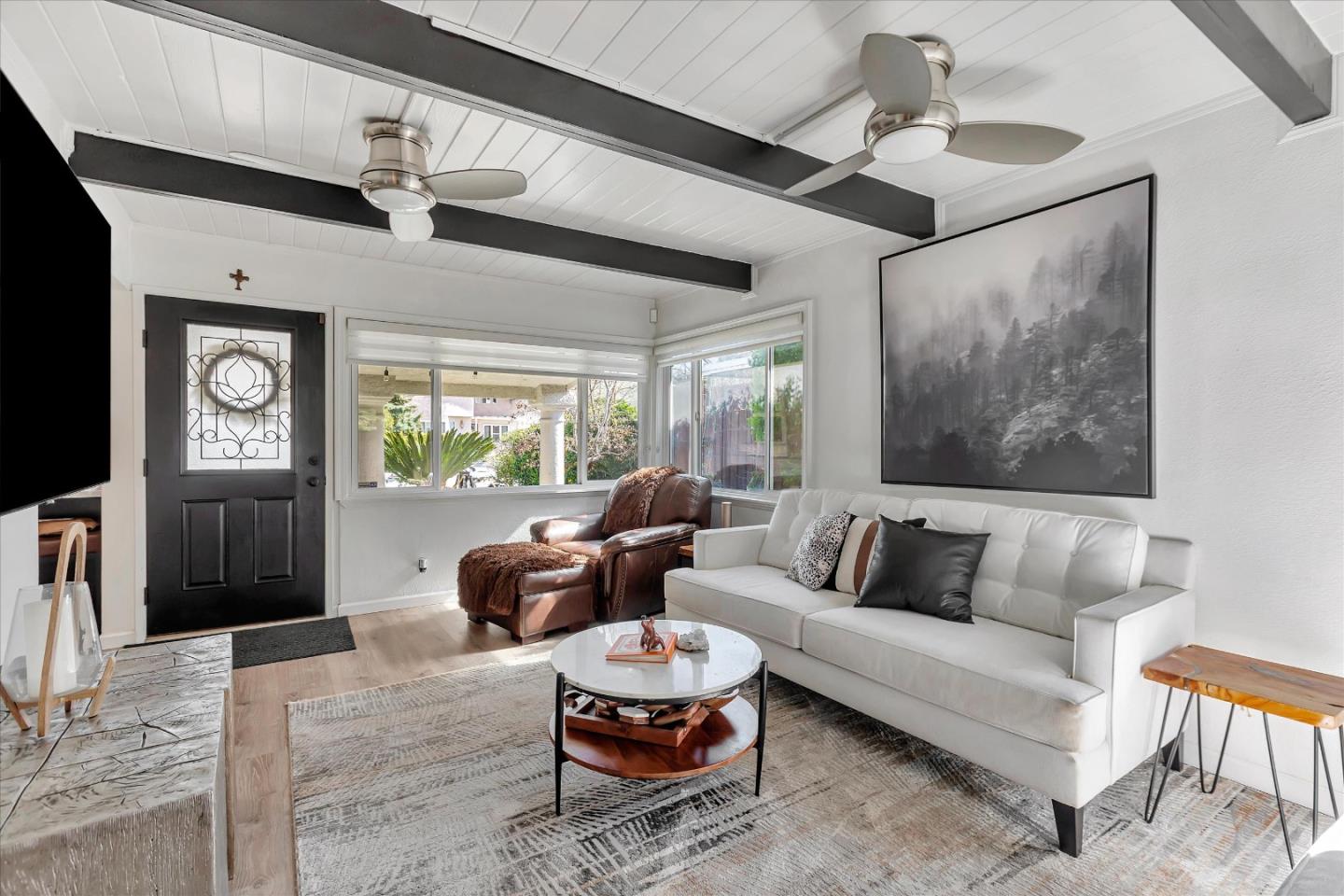 39 Carnegie Drive Milpitas, CA 95035 - Photo 3 of 39 a living room with furniture and a large window
