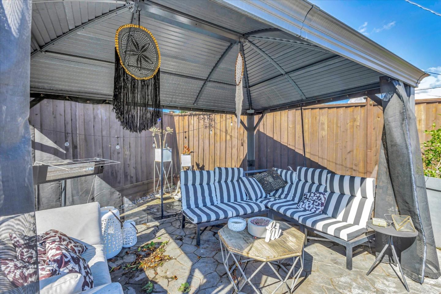 39 Carnegie Drive Milpitas, CA 95035 - Photo 31 of 39 a view of a dining room with wooden floor and a chandelier