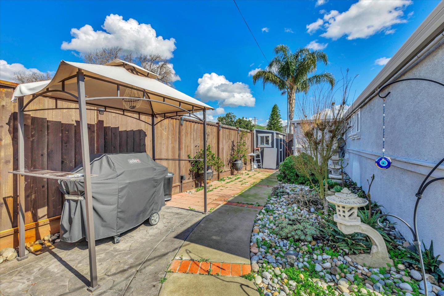 39 Carnegie Drive Milpitas, CA 95035 - Photo 32 of 39 a view of a chairs and table in backyard