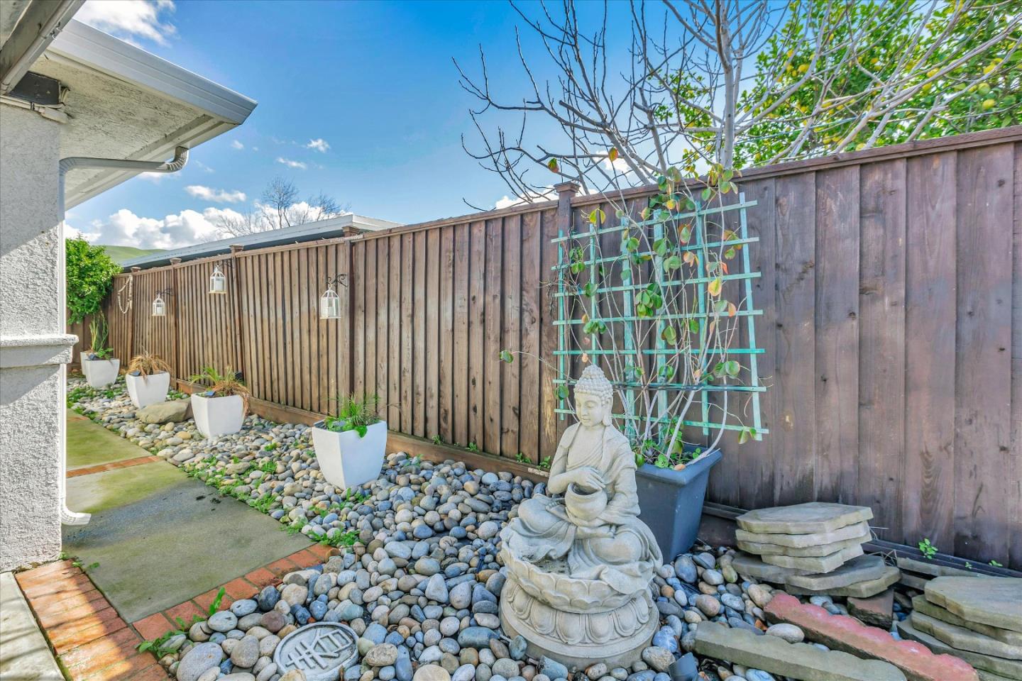 39 Carnegie Drive Milpitas, CA 95035 - Photo 36 of 39 a view of a chairs and table in backyard