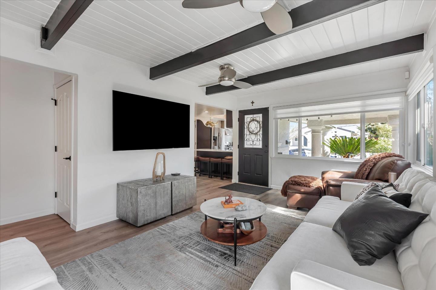 39 Carnegie Drive Milpitas, CA 95035 - Photo 4 of 39 a living room with furniture and a flat screen tv