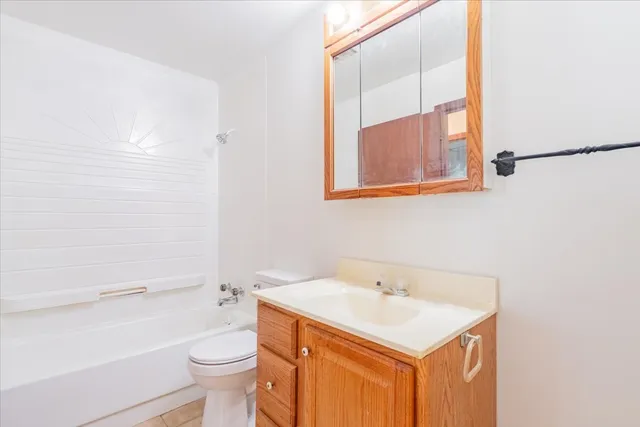 a view of a chandelier fan in a room