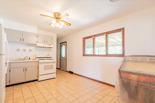 a bathroom with a sink a toilet and a bathtub