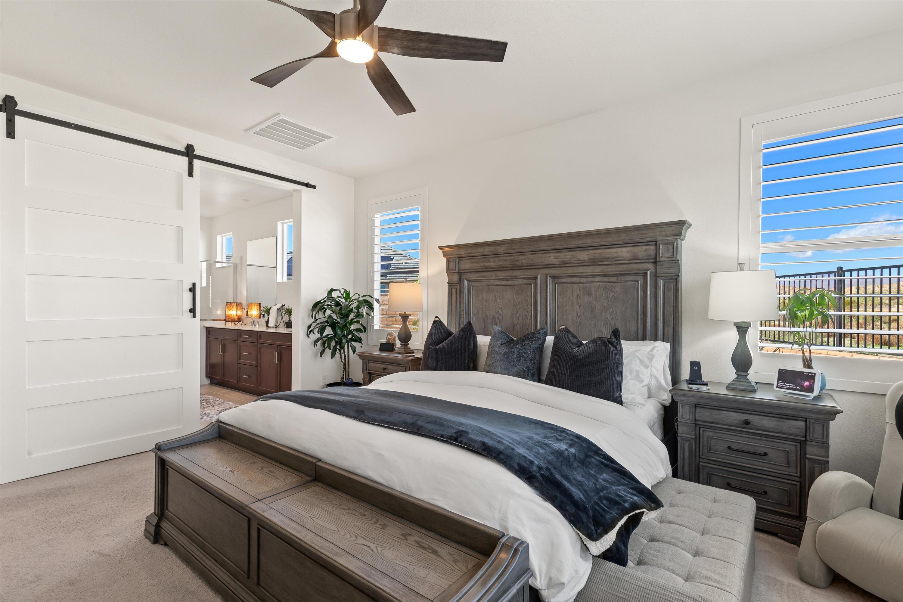 42940 Ascona Lane Indio, CA 92203 - Photo 12 of 36 a bedroom with a bed couch and window