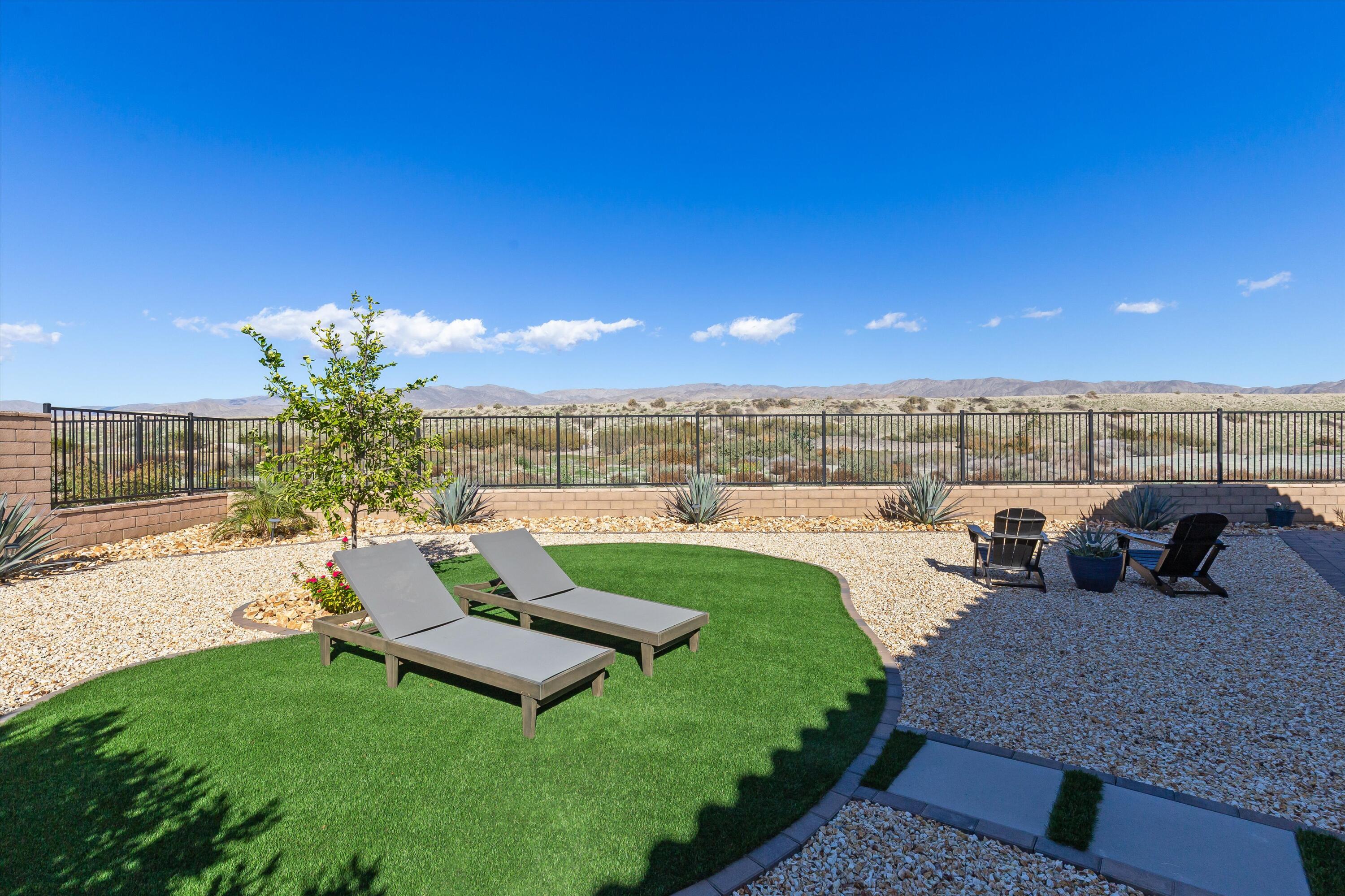 42940 Ascona Lane Indio, CA 92203 - Photo 24 of 36 a roof deck with table and chairs