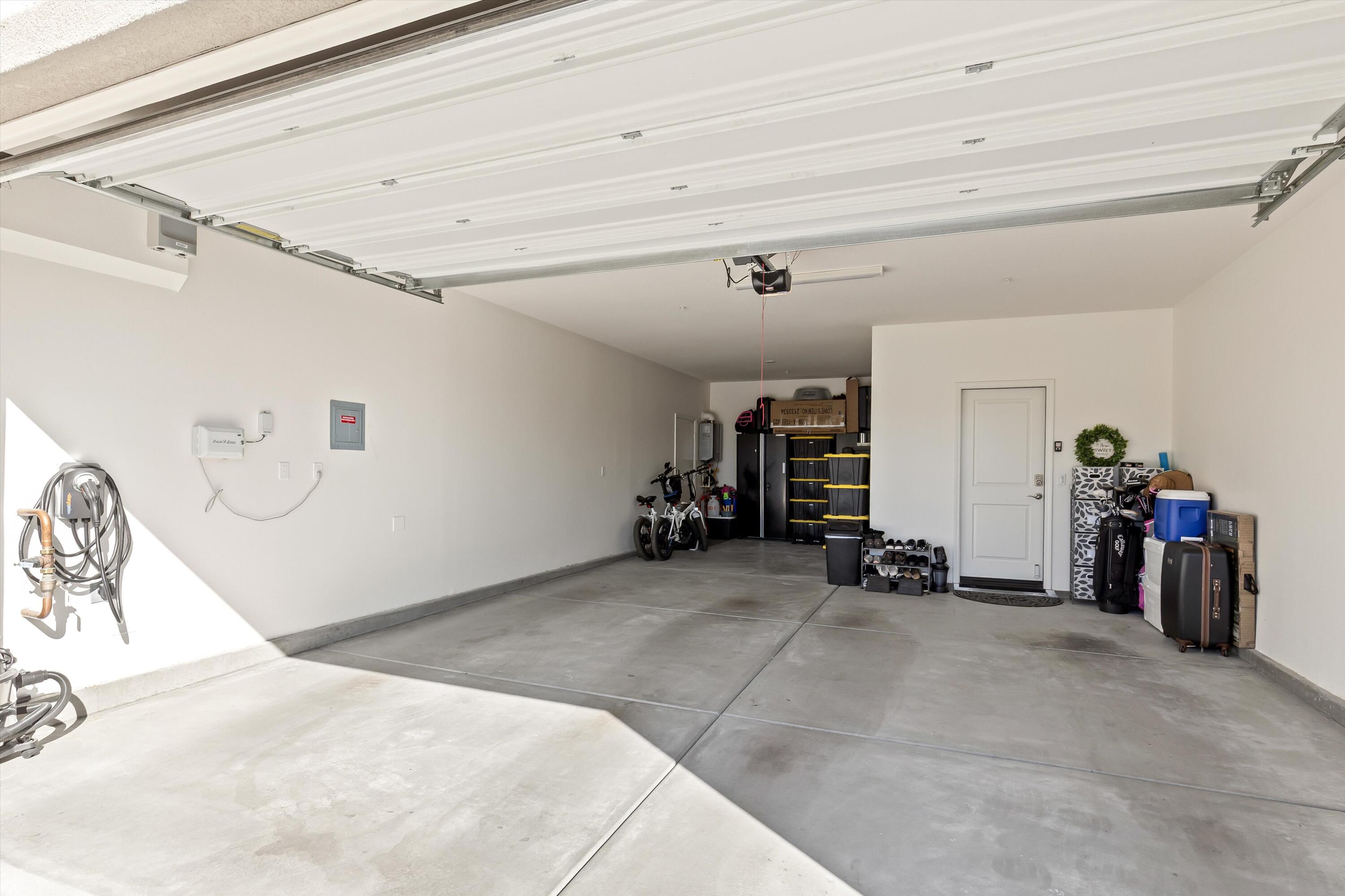 42940 Ascona Lane Indio, CA 92203 - Photo 25 of 36 a view of a garage with storage
