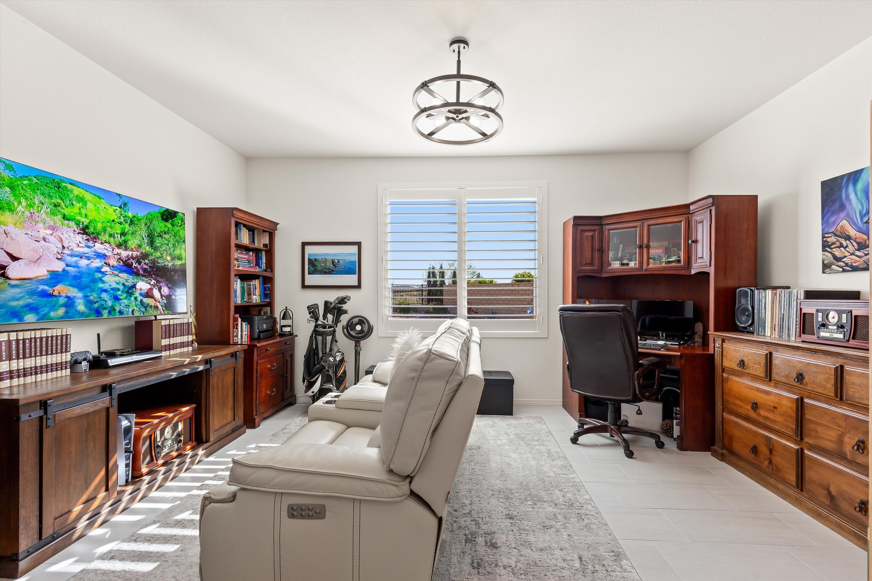 42940 Ascona Lane Indio, CA 92203 - Photo 10 of 36 a view of a workspace with furniture and a window