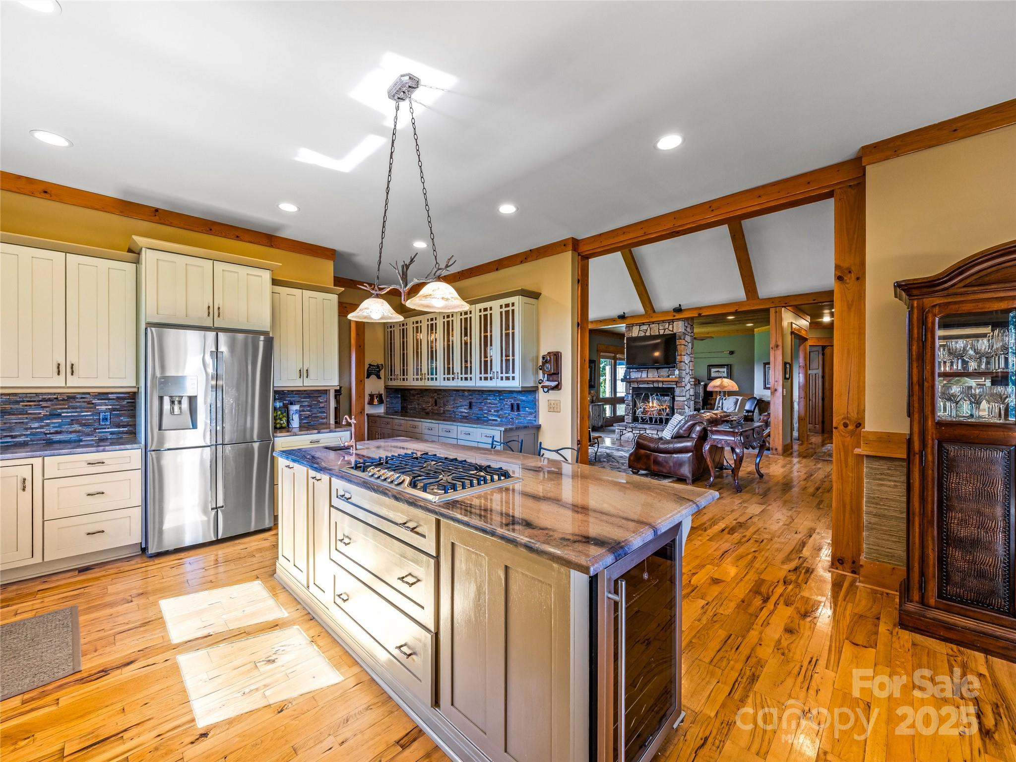 12 Trailridge Road Asheville, NC 28804 - Photo 14 of 45 a kitchen with stainless steel appliances granite countertop a stove and a refrigerator