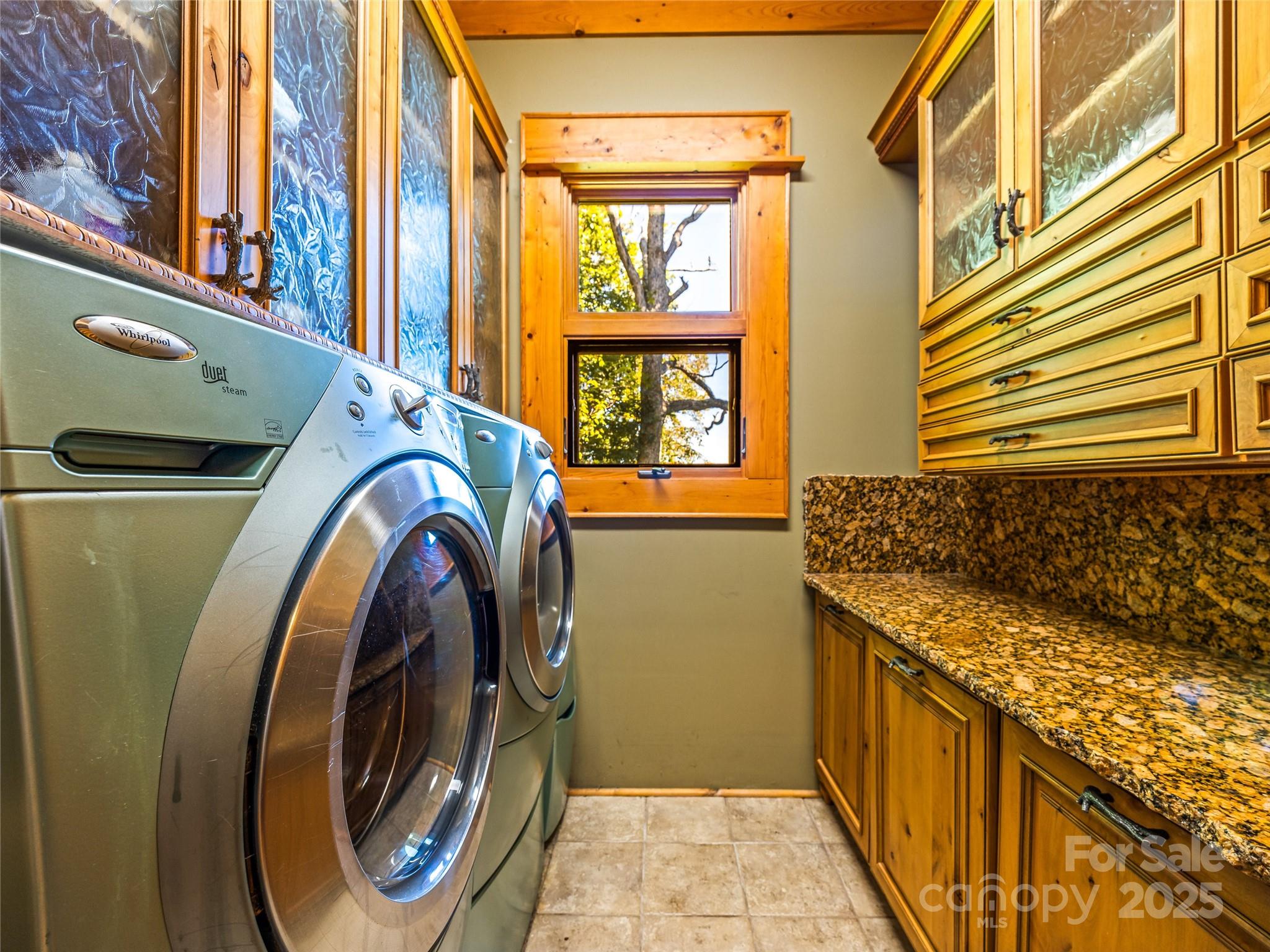12 Trailridge Road Asheville, NC 28804 - Photo 17 of 45 a utility room with dryer and washer