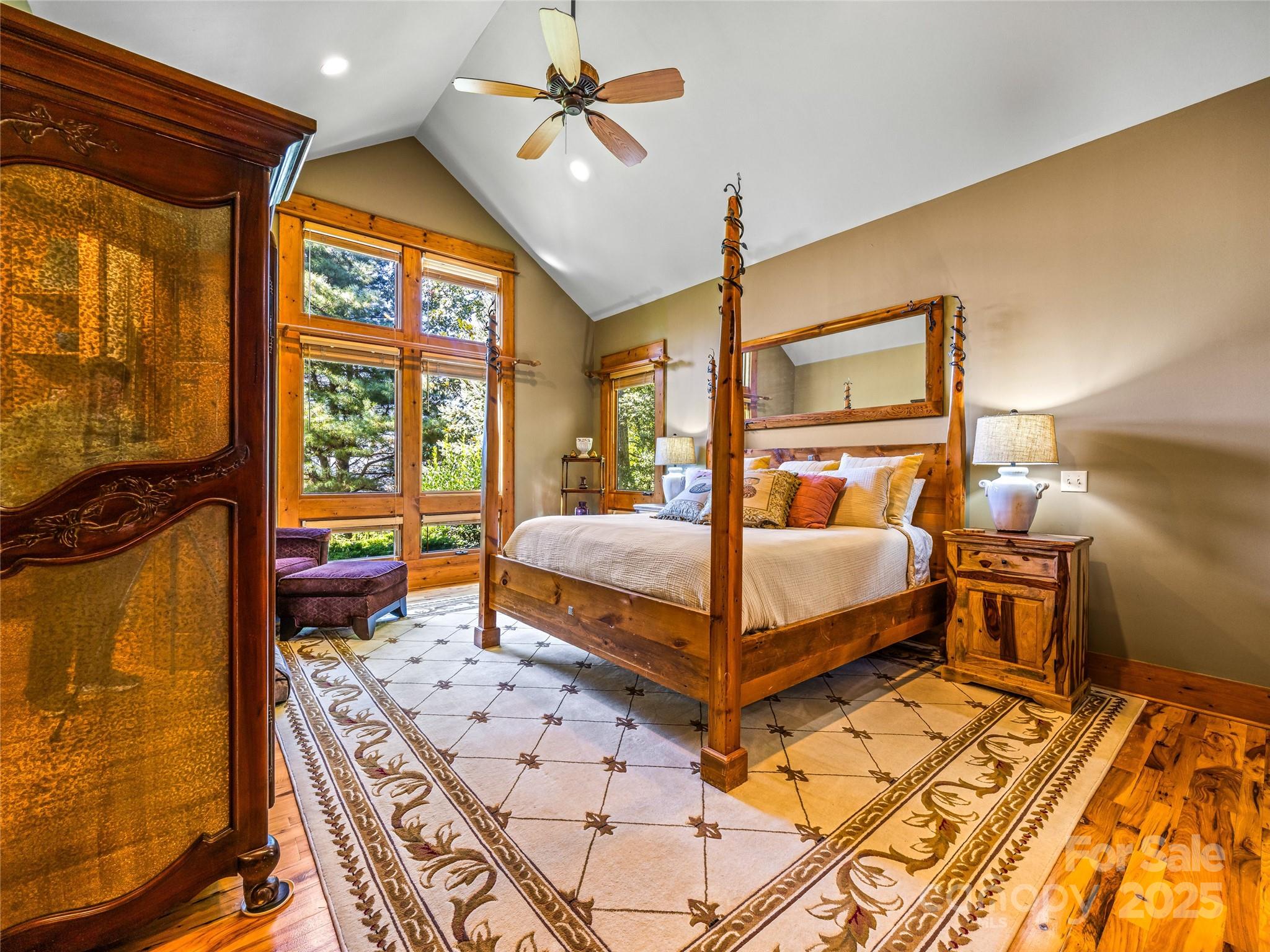 12 Trailridge Road Asheville, NC 28804 - Photo 18 of 45 a bedroom with a bed and wooden floor