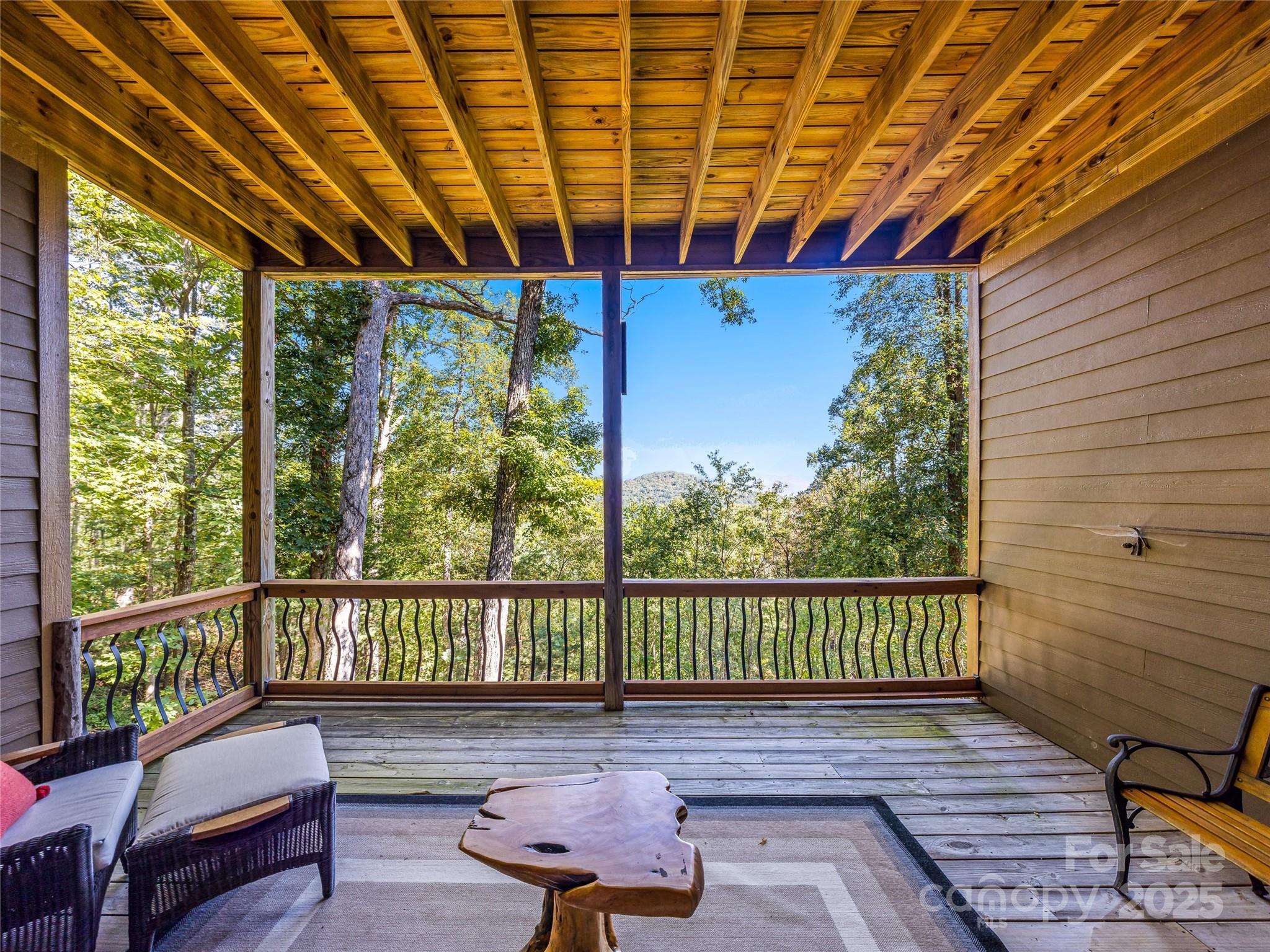 12 Trailridge Road Asheville, NC 28804 - Photo 26 of 45 a view of a wooden deck with furniture
