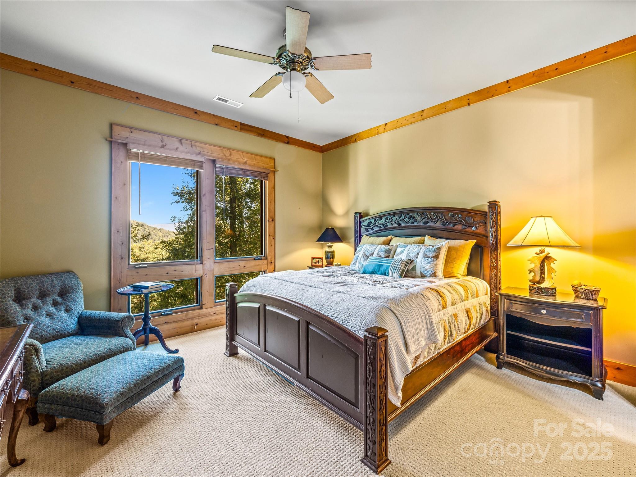12 Trailridge Road Asheville, NC 28804 - Photo 29 of 45 a bedroom with a bed couch and window