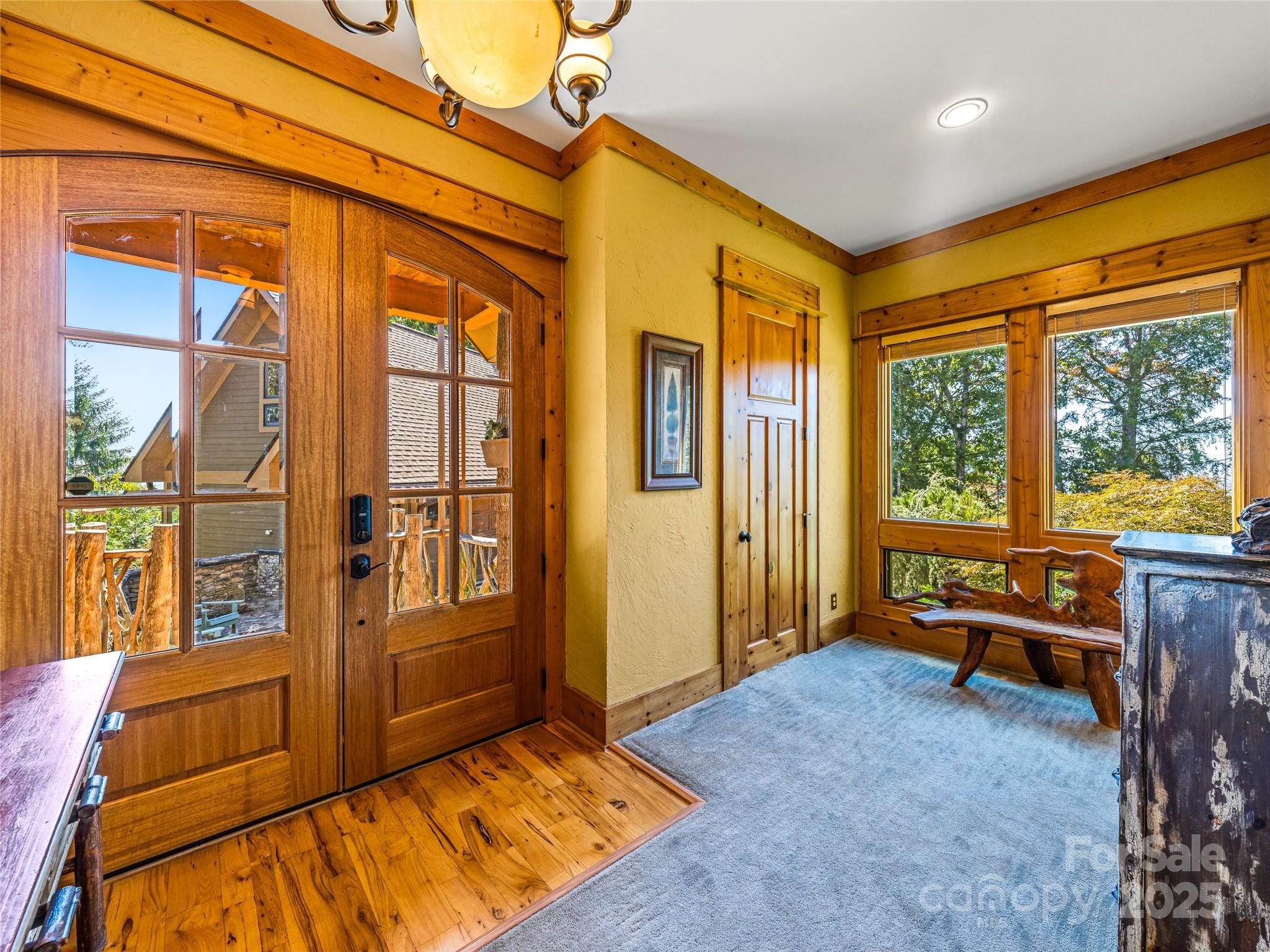 12 Trailridge Road Asheville, NC 28804 - Photo 33 of 45 a bedroom with a bed and wooden floor