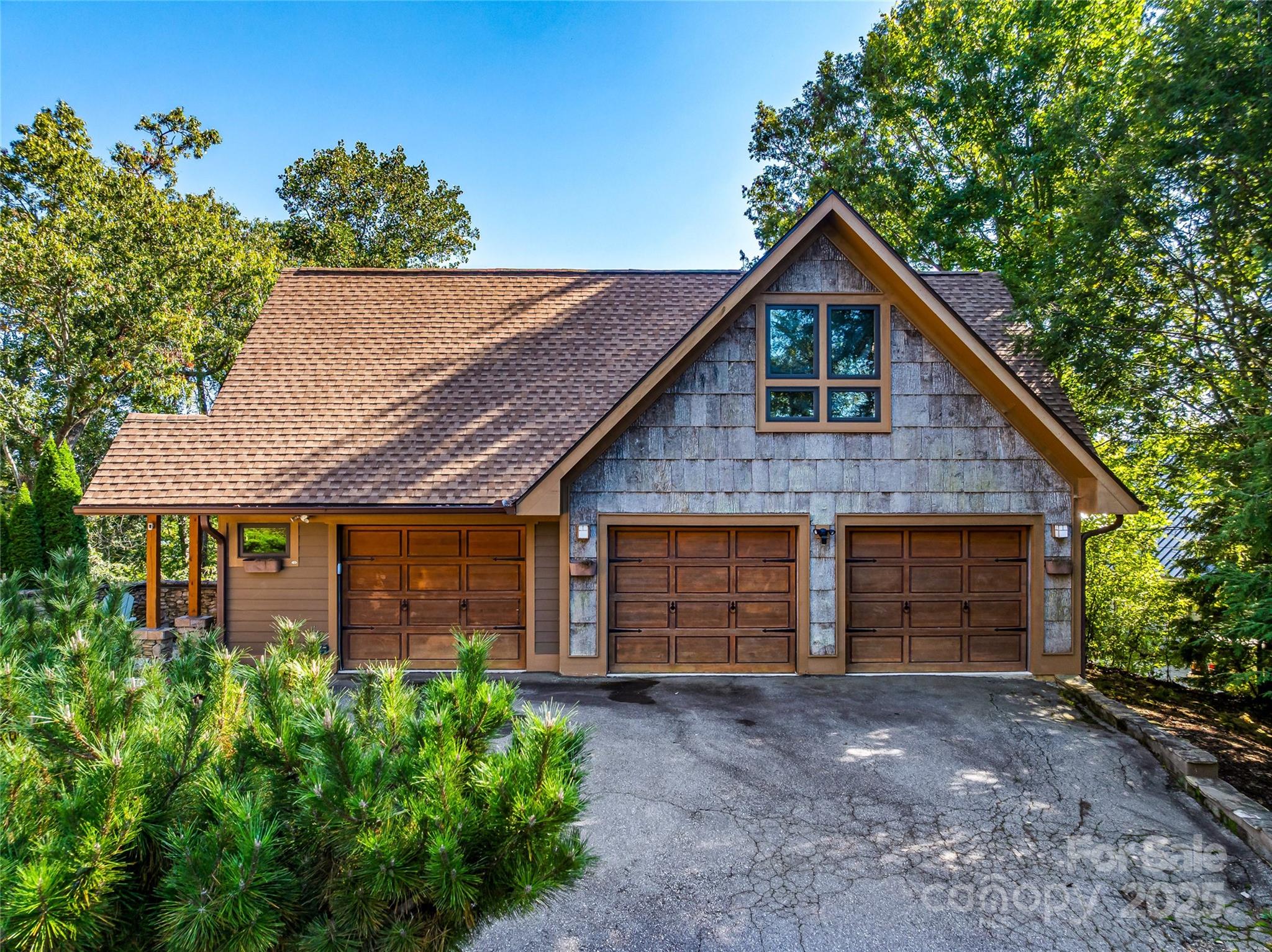 12 Trailridge Road Asheville, NC 28804 - Photo 36 of 45 a view of a house with a yard and garage