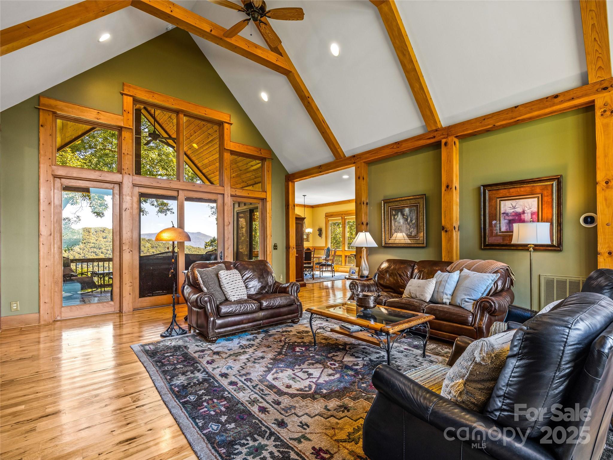 12 Trailridge Road Asheville, NC 28804 - Photo 6 of 45 a living room with furniture or couch and a table