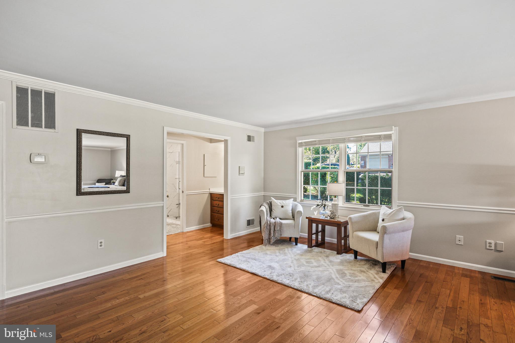 12148 Mt Albert Road Ellicott City, MD 21042 - Photo 23 of 70 a living room with furniture and wooden floor