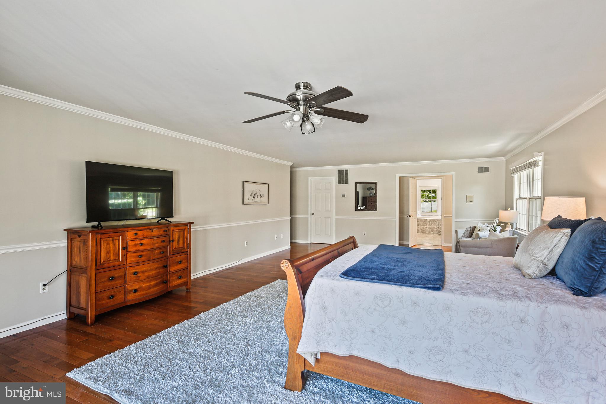 12148 Mt Albert Road Ellicott City, MD 21042 - Photo 24 of 70 a bedroom with furniture and wooden floor