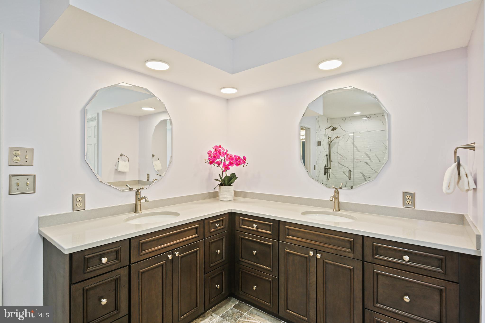 12148 Mt Albert Road Ellicott City, MD 21042 - Photo 26 of 70 a bathroom with a sink and a mirror