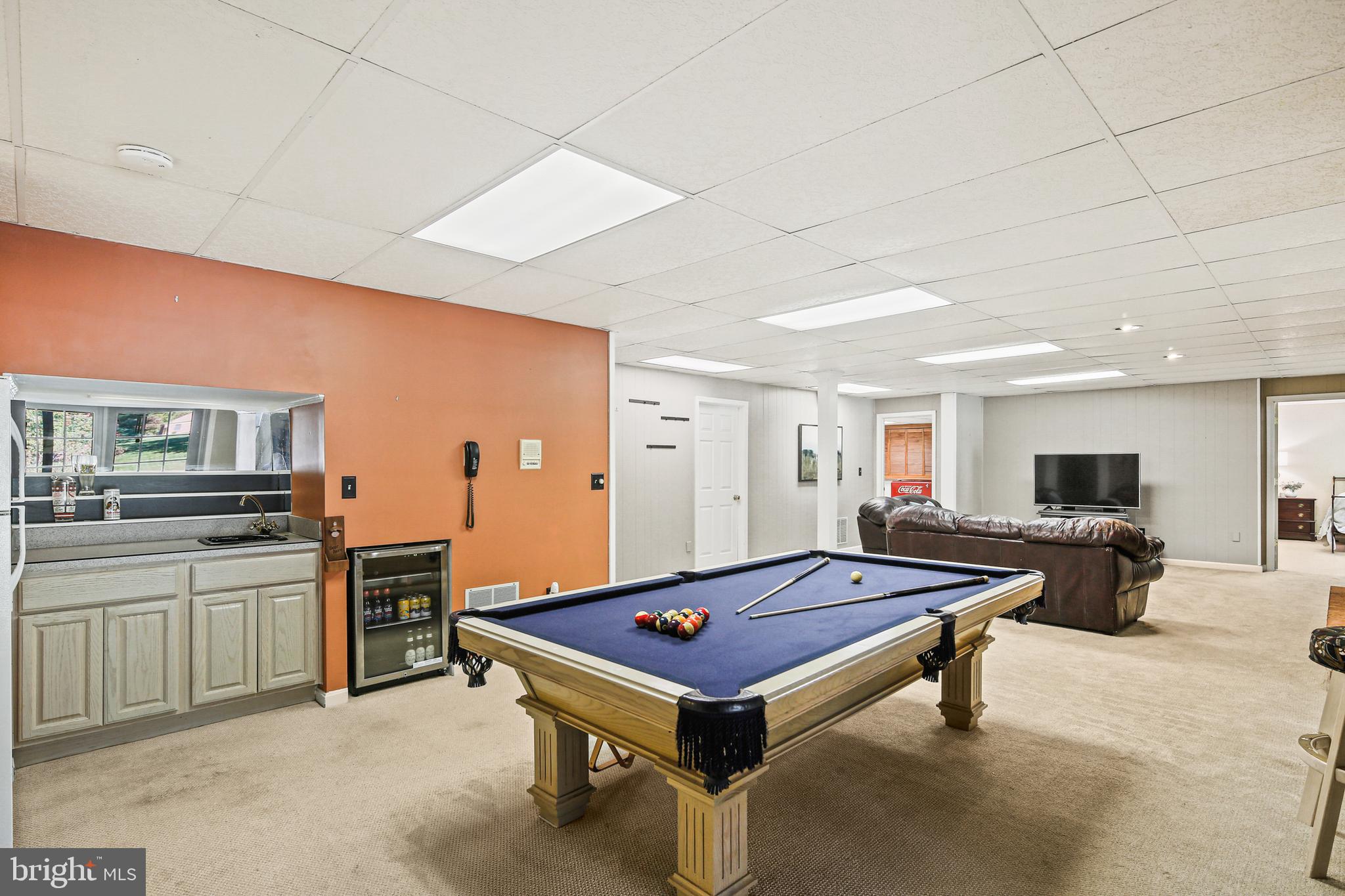 12148 Mt Albert Road Ellicott City, MD 21042 - Photo 41 of 70 a living room with stainless steel appliances kitchen island furniture and a kitchen view