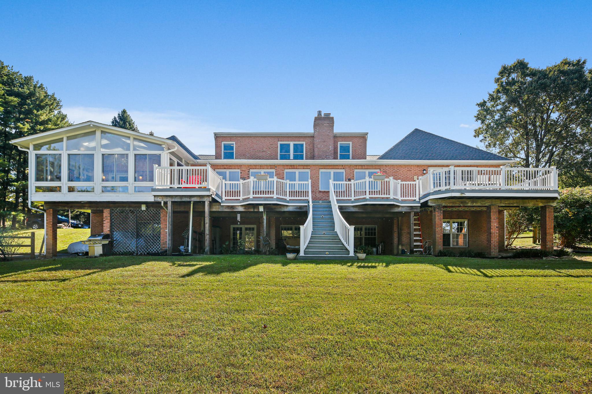 12148 Mt Albert Road Ellicott City, MD 21042 - Photo 50 of 70 a front view of a building with a garden