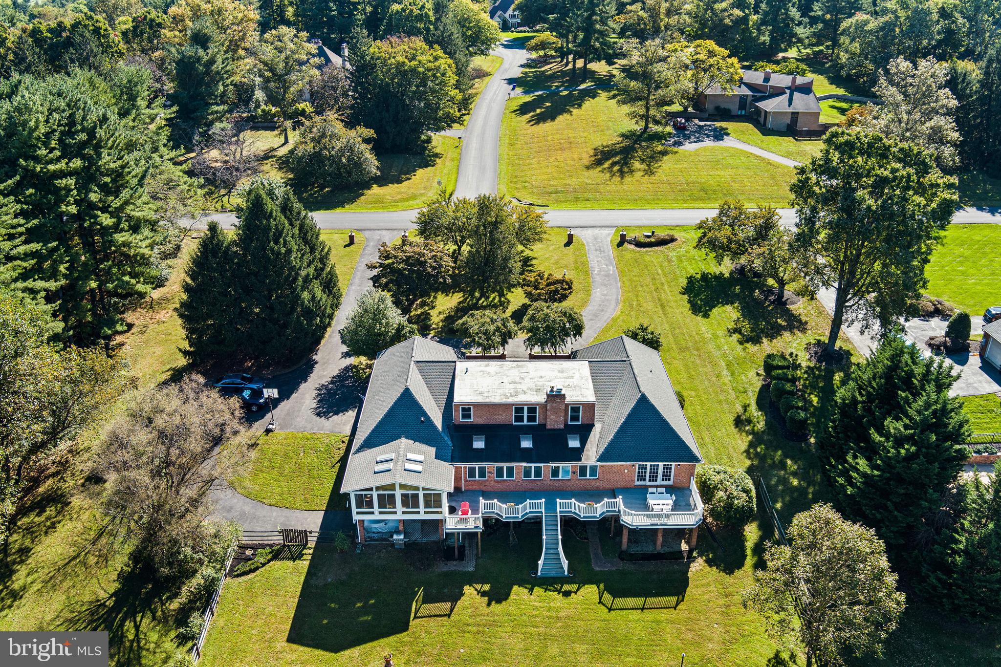 12148 Mt Albert Road Ellicott City, MD 21042 - Photo 57 of 70 a aerial view of a house with swimming pool and lake view