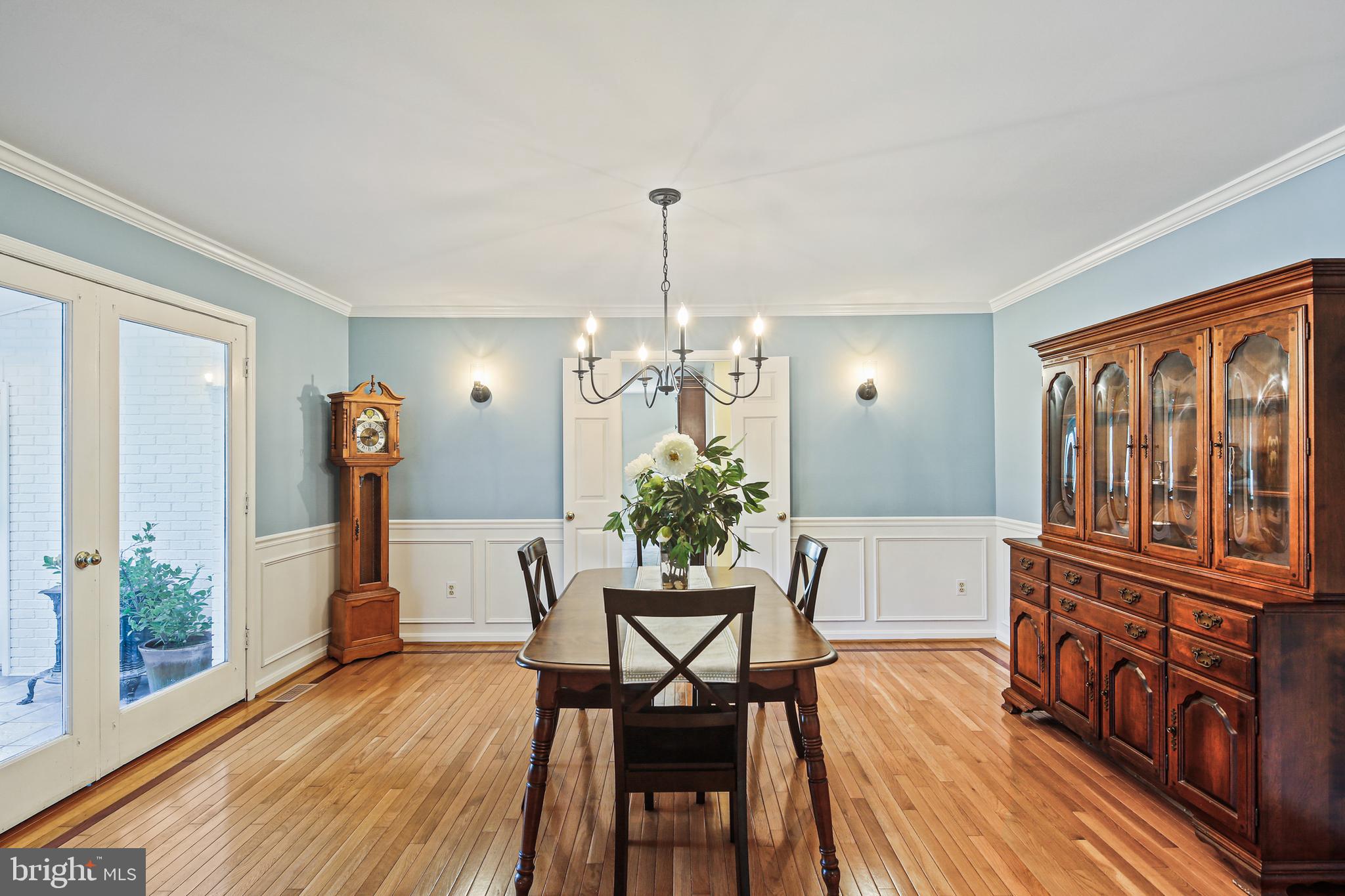 12148 Mt Albert Road Ellicott City, MD 21042 - Photo 8 of 70 a view of a dining room with furniture window and wooden floor
