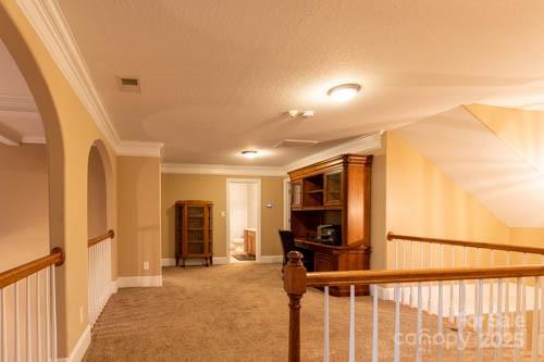 207 Streamside Place Mooresville, NC 28115 - Photo 21 of 42 a view of a hallway to a livingroom with furniture