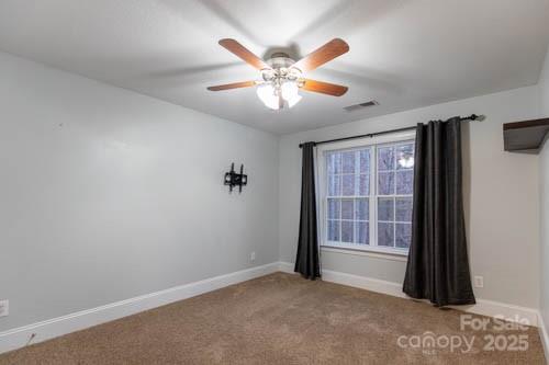 207 Streamside Place Mooresville, NC 28115 - Photo 23 of 42 a view of an empty room with a window