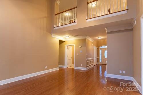 207 Streamside Place Mooresville, NC 28115 - Photo 9 of 42 a view of an entryway with wooden floor
