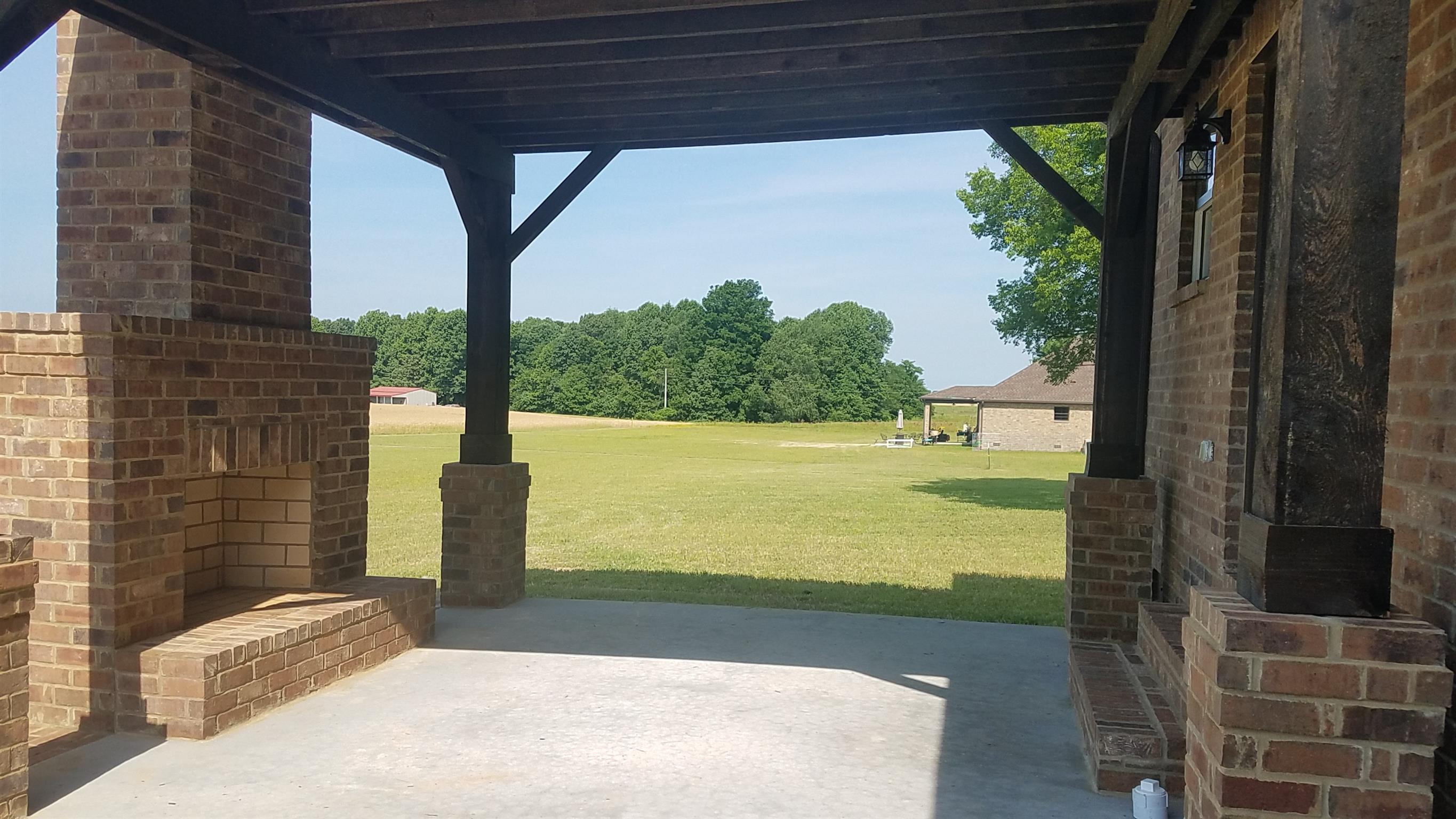 5064 Edgar Dillard Road Greenbrier, TN 37073 - Photo 14 of 29 Covered Patio with Fireplace