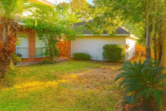 a view of a yard with an outdoor space