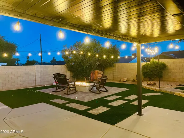 a view of an chairs and tables in the patio