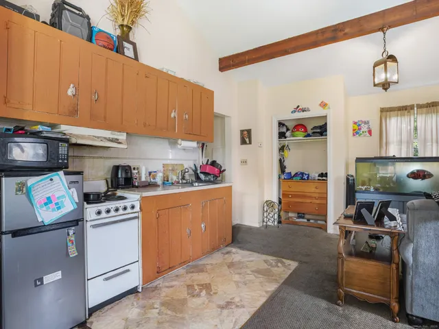 a view of a two chairs in a patio