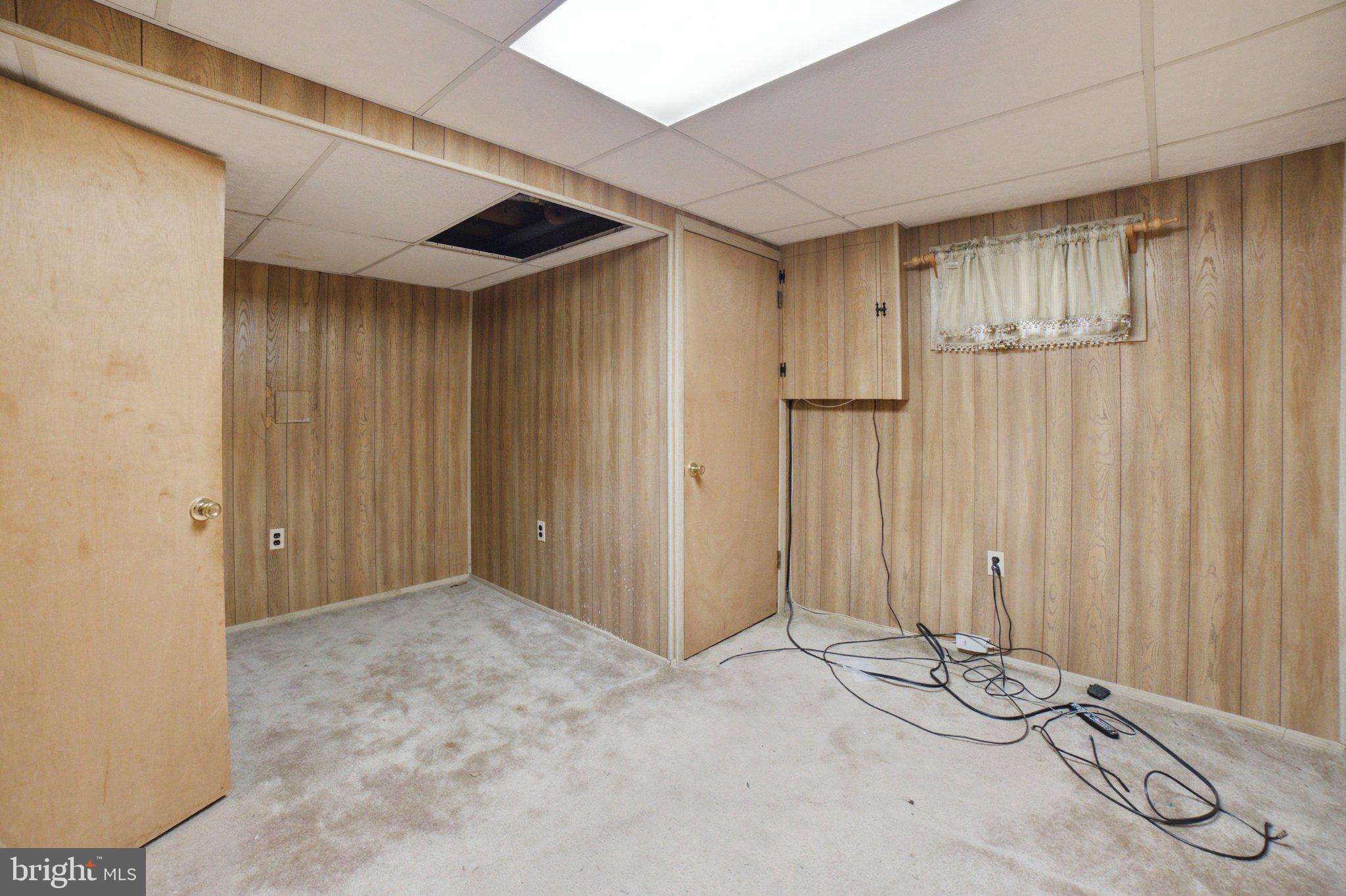 907 Logwood Road Capitol Heights, MD 20743 - Photo 15 of 16 Versatile space with potential charm.