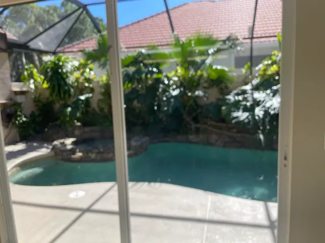 a view of a backyard of a house