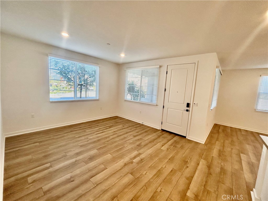 6114 Valentina Way, Unit 101 Eastvale, CA 92880 - Photo 13 of 23 a view of an empty room and window