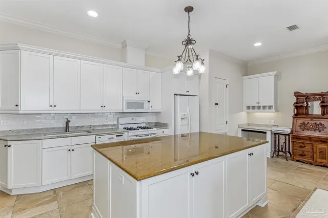 a room with a bed and a large window