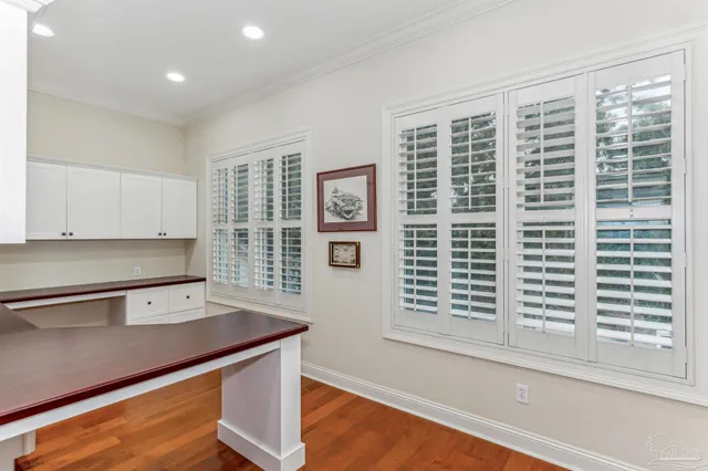 a bathroom with a shower and a sink