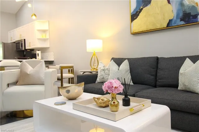 a living room with furniture and a couch