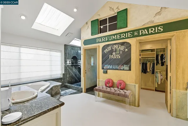 a very nice looking room with a table and a chandelier