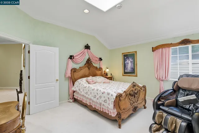 a view of a patio with table and chairs and potted plants
